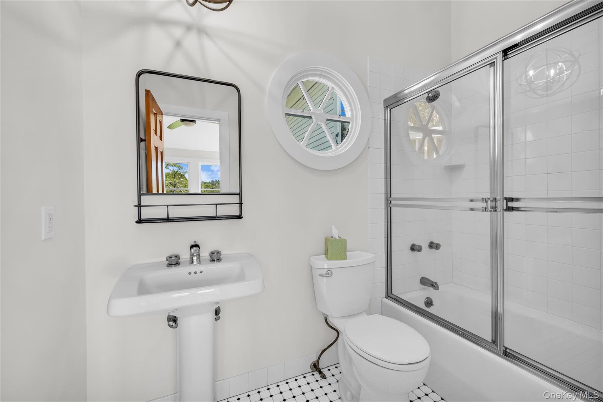 238 Beaver Dam Road Brookhaven, NY 11719 - Photo 27 of 44 a bathroom with a toilet sink and a shower