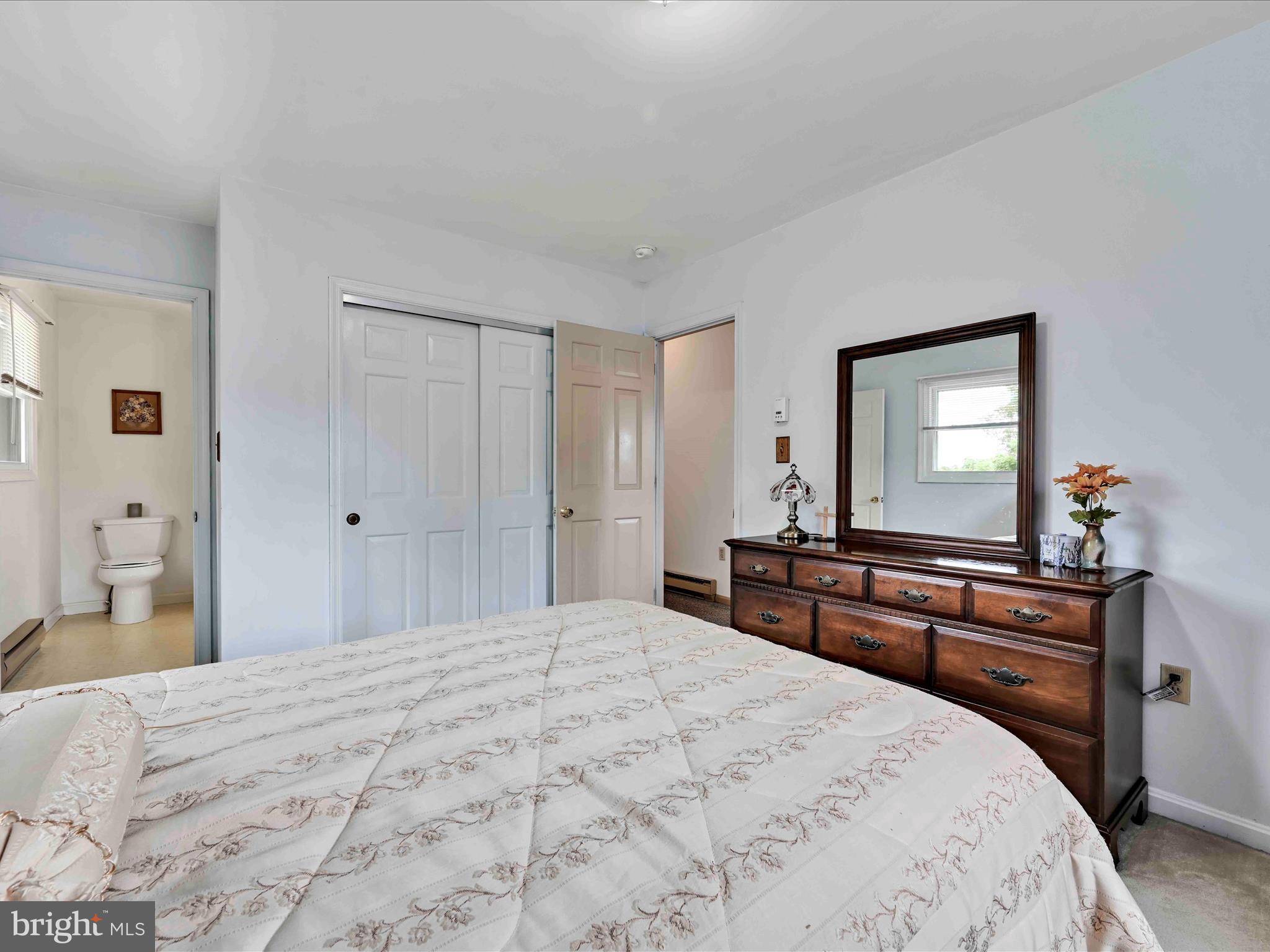 301 Owl Hill Road Lititz, PA 17543 - Photo 11 of 35 a bedroom with a bed and a dresser in it