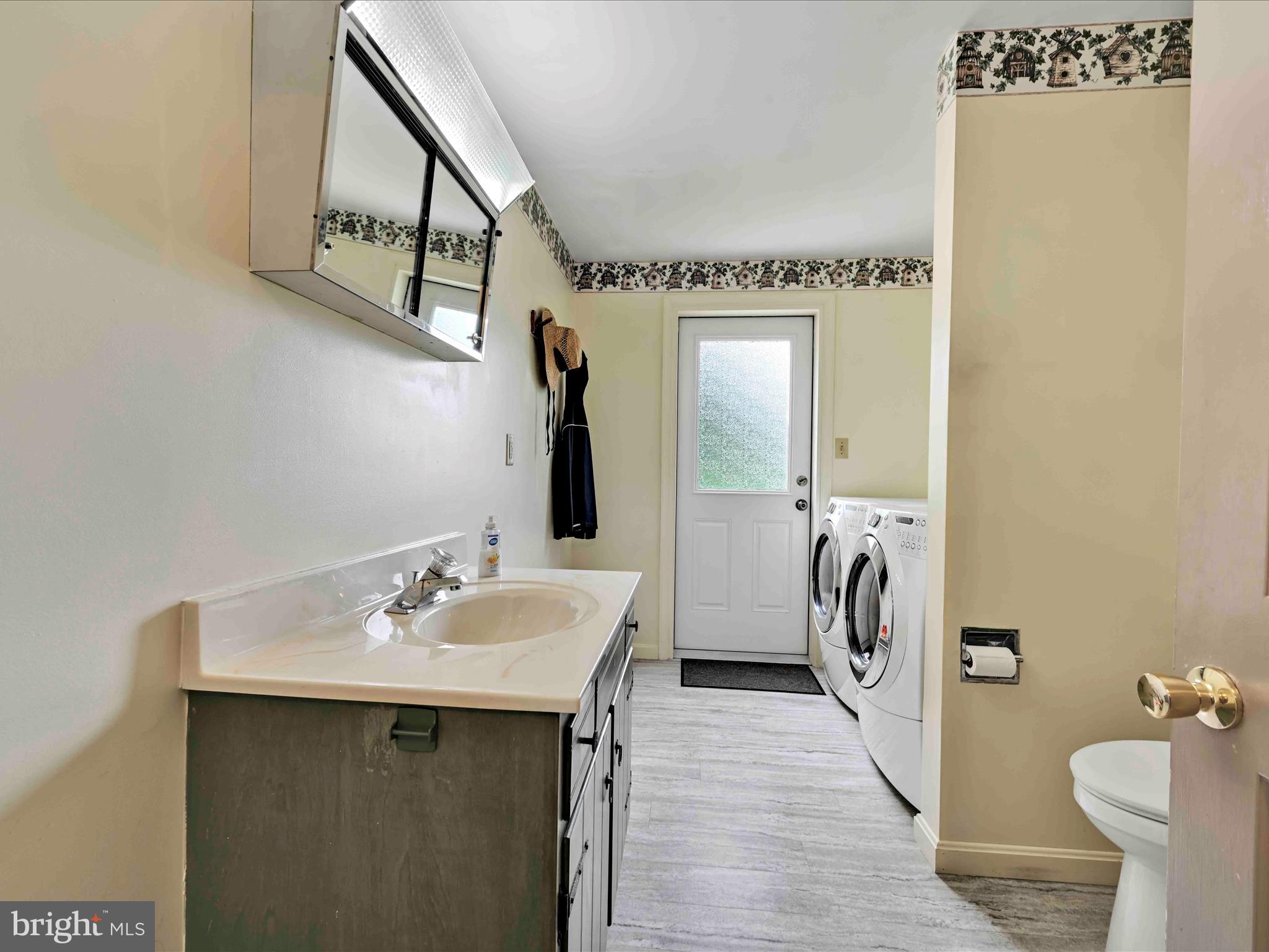301 Owl Hill Road Lititz, PA 17543 - Photo 20 of 35 a bathroom with a sink mirror and toilet