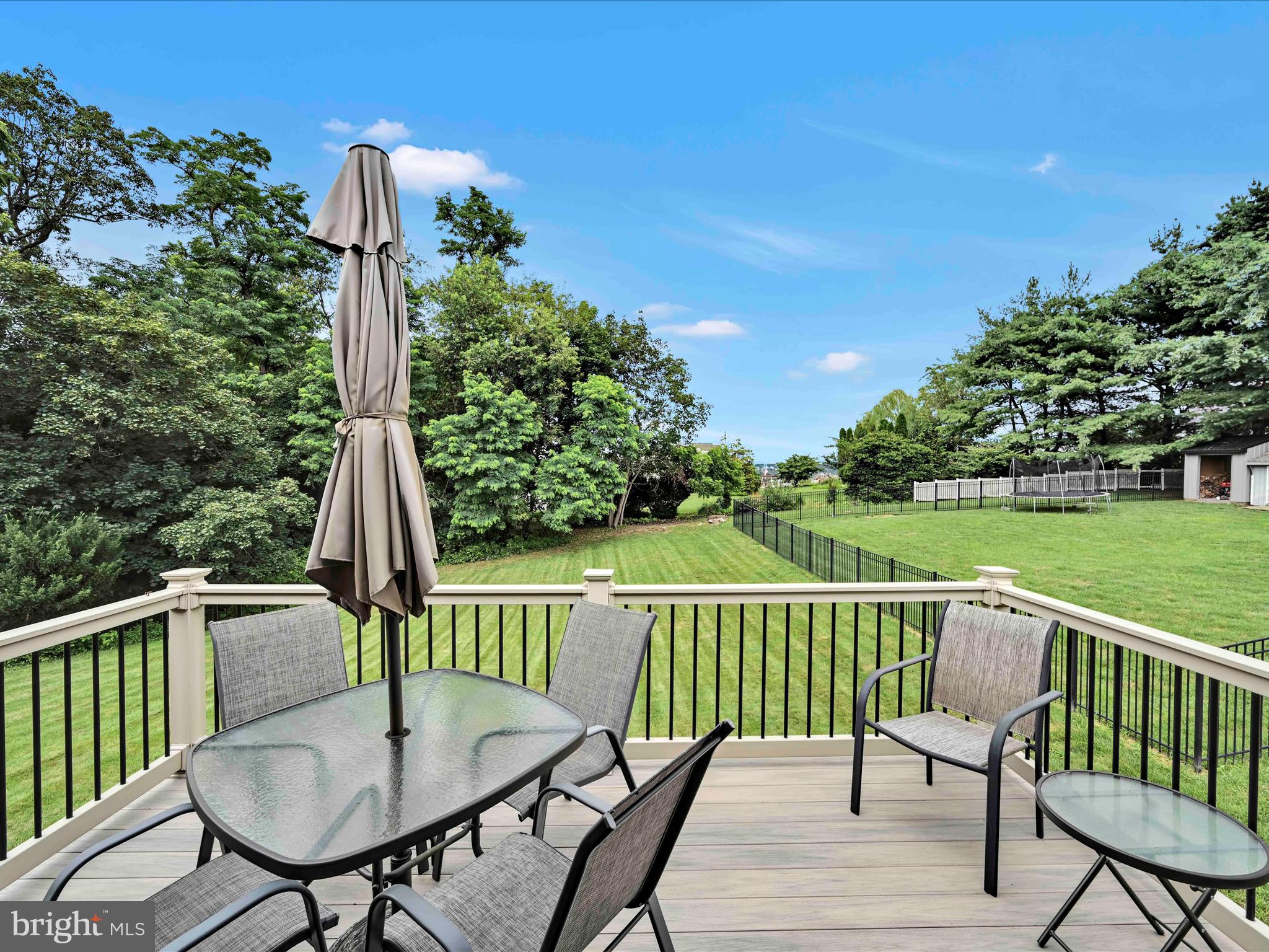 301 Owl Hill Road Lititz, PA 17543 - Photo 21 of 35 a deck with a table and chairs