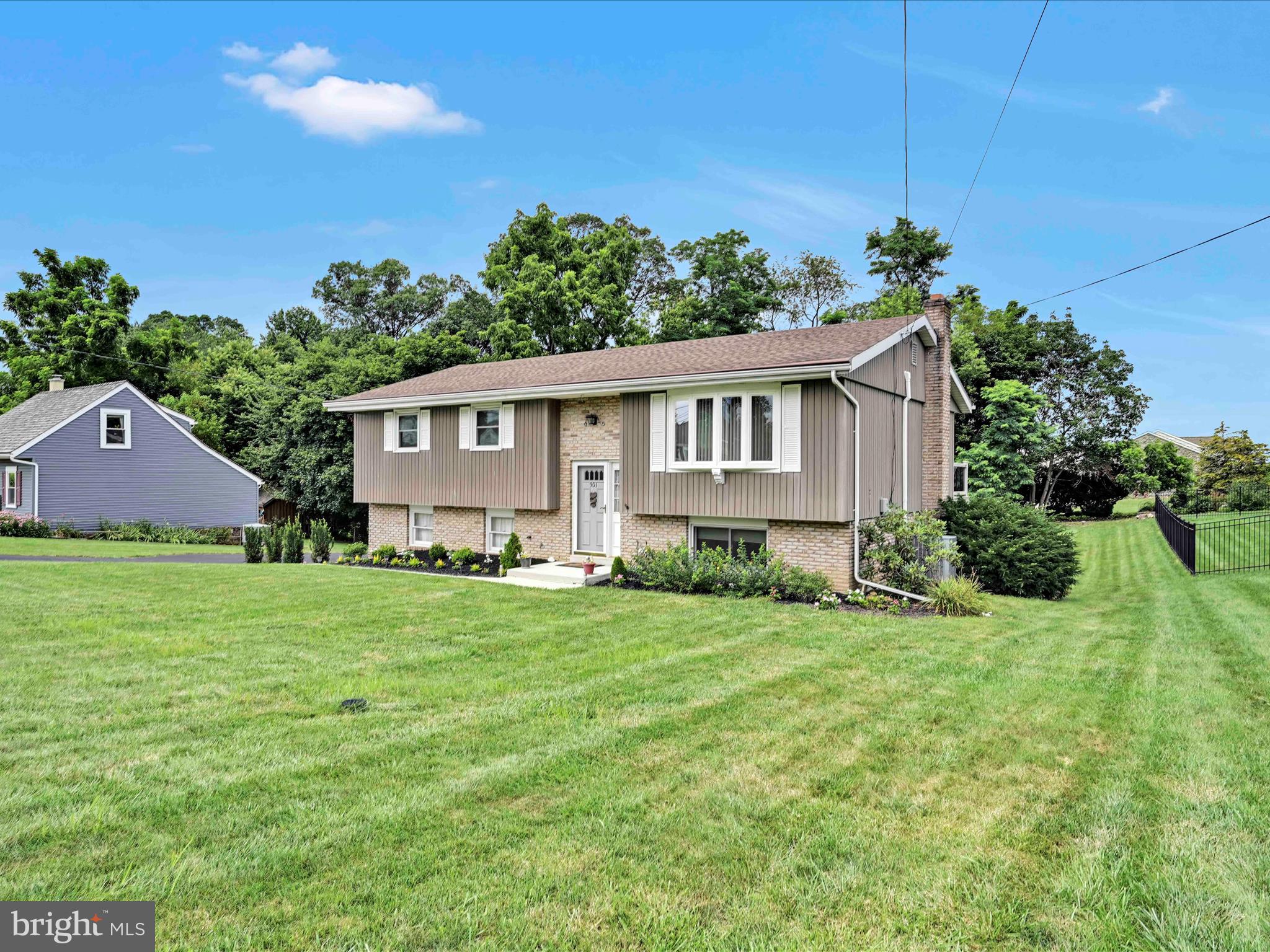 301 Owl Hill Road Lititz, PA 17543 - Photo 32 of 35 a view of an house with backyard space and garden