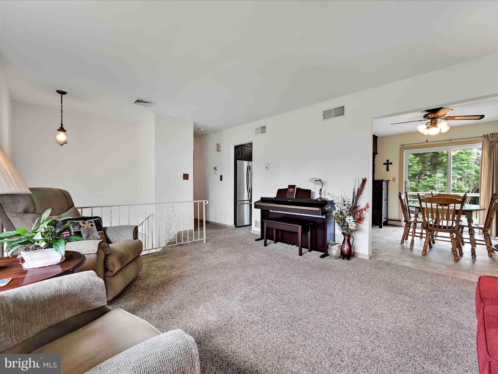 301 Owl Hill Road Lititz, PA 17543 - Photo 4 of 35 a living room with furniture and a piano