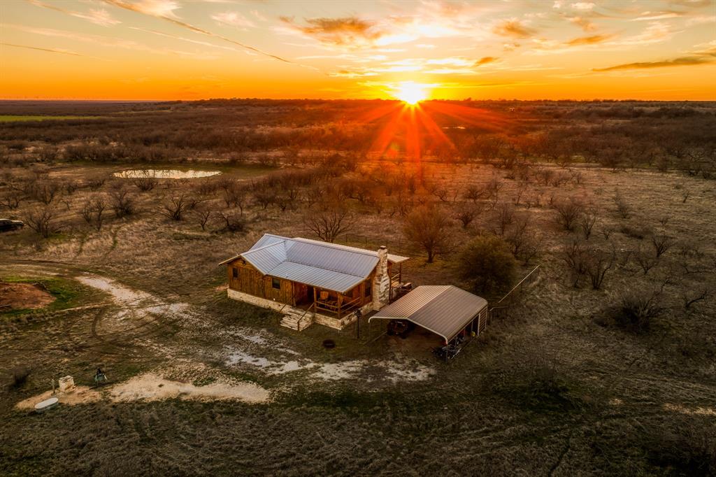 3151 Orth Road Olney, TX 76374 - Photo 33 of 37 an aerial view of a house with a yard