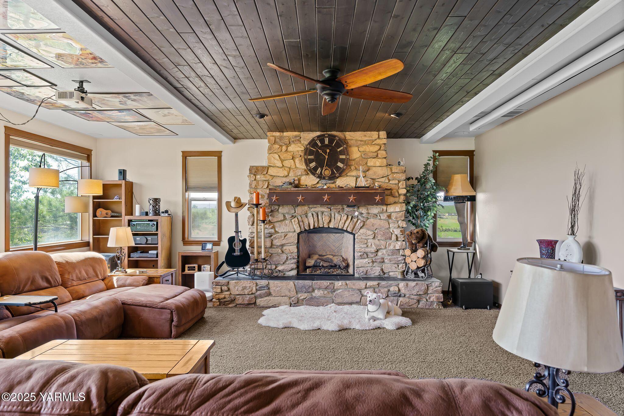 12900 Douglas Road Yakima, WA 98908 - Photo 13 of 62 a living room with furniture and a fireplace