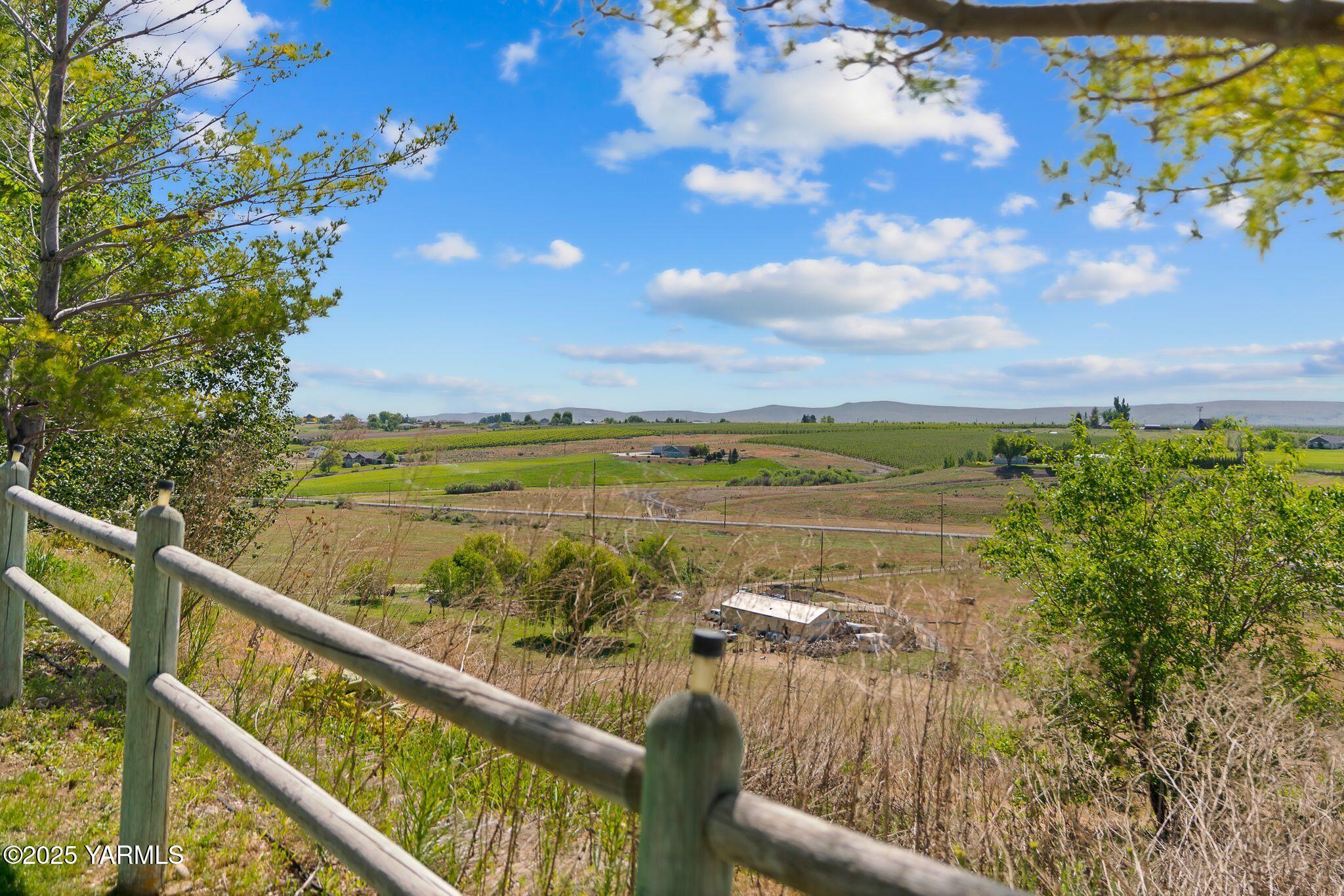 12900 Douglas Road Yakima, WA 98908 - Photo 52 of 62 a view of a lake from a balcony