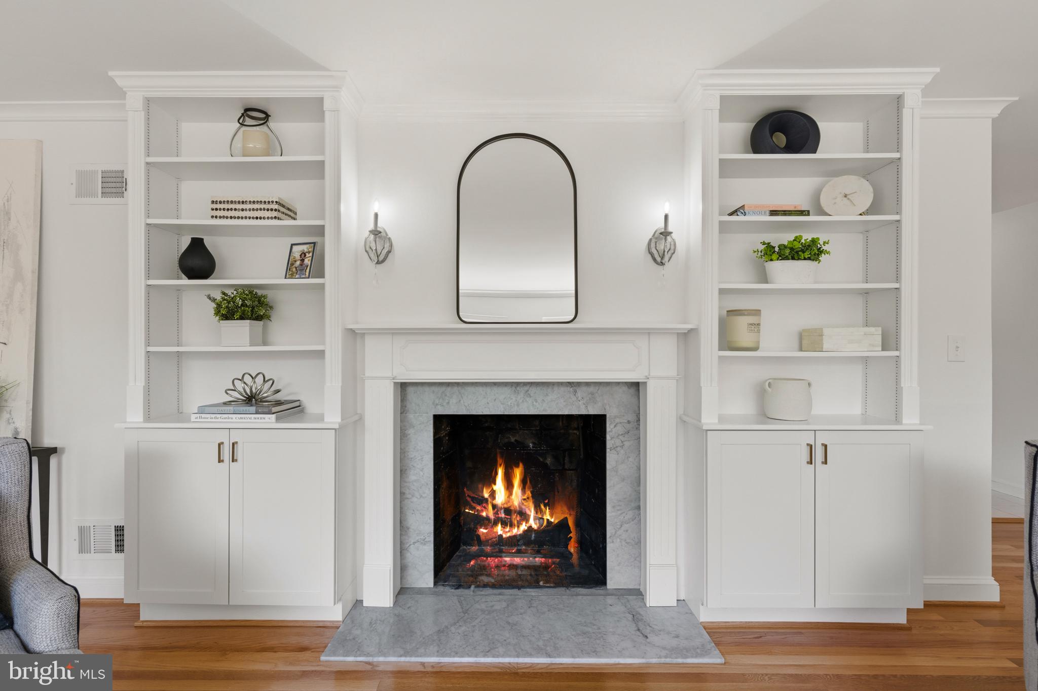 5612 Bent Branch Road Bethesda, MD 20816 - Photo 21 of 60 Built-in bookshelves surround the gas fireplace
