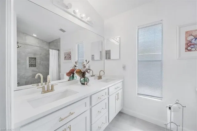 a bathroom with a shower and toilet