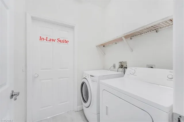 a bedroom with furniture and a bed