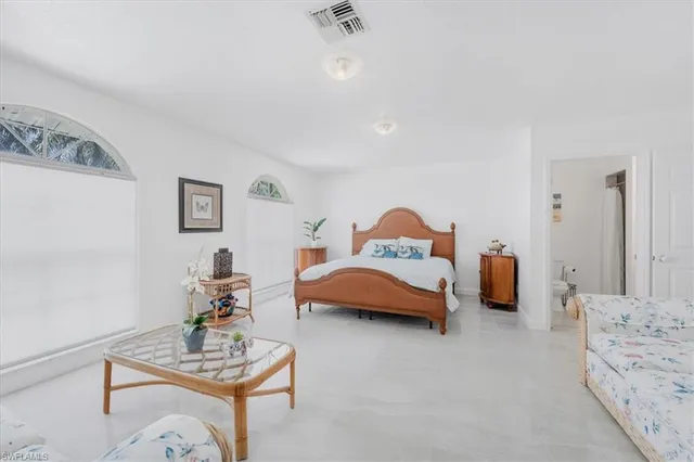 a view of a backyard with sitting area