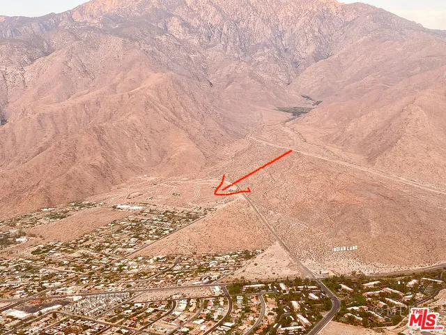 a view of mountain with sunset