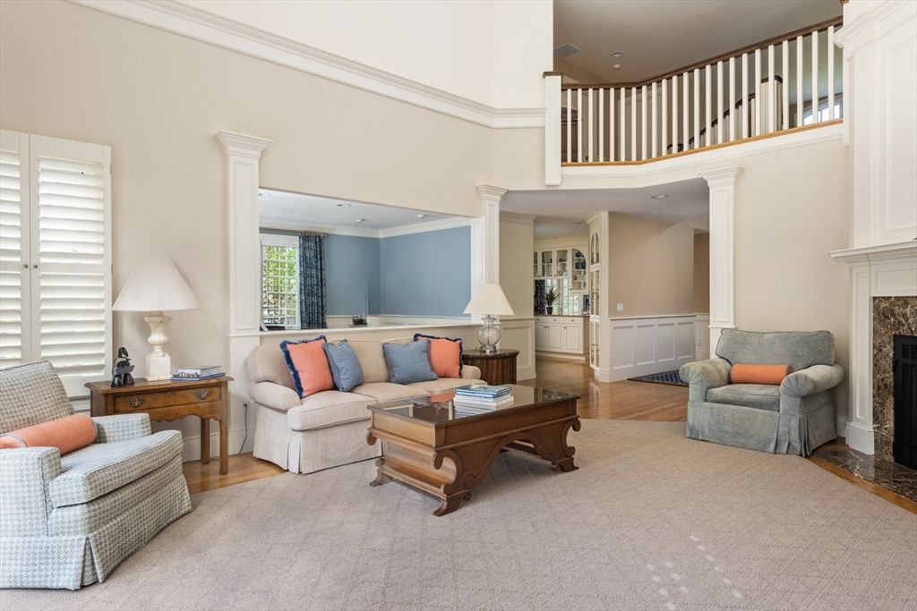 2 Open Drive Sandwich, MA 02563 - Photo 11 of 34 a living room with furniture a fireplace and a large window