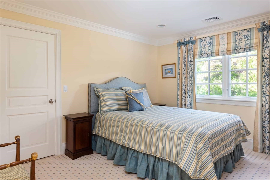 2 Open Drive Sandwich, MA 02563 - Photo 22 of 34 a bedroom with a bed and a window