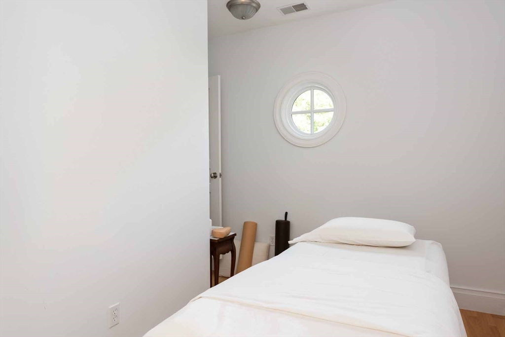 2 Open Drive Sandwich, MA 02563 - Photo 28 of 34 a bedroom with a bed and a table