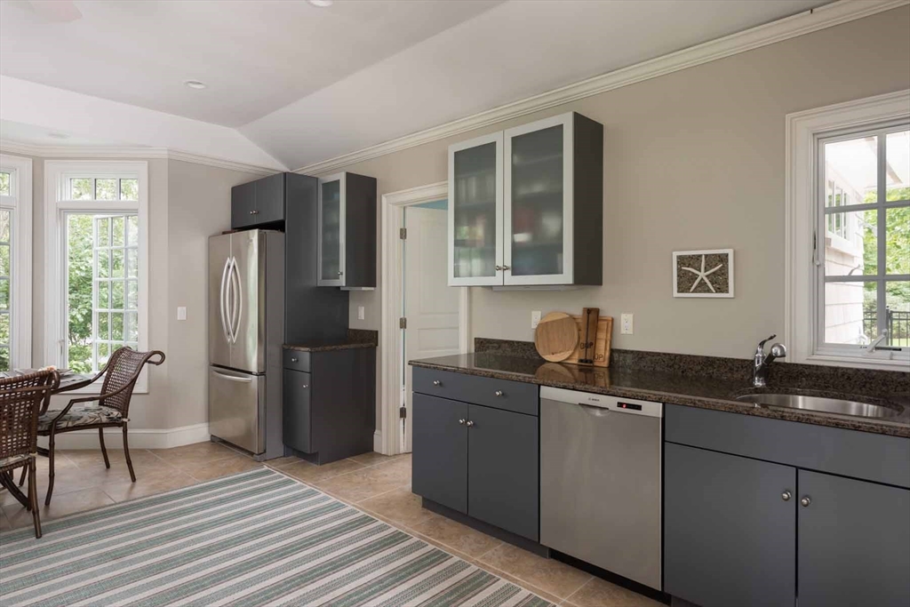 2 Open Drive Sandwich, MA 02563 - Photo 34 of 34 a kitchen with a sink refrigerator and dining table