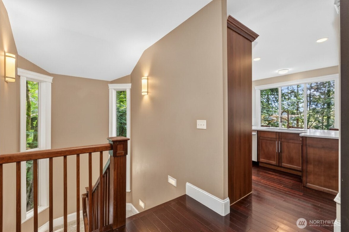 45 Cascade Lane Bellingham, WA 98229 - Photo 18 of 40 a view of a hallway with wooden floor and windows