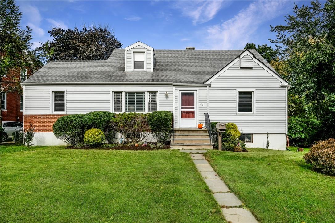 170 Osborn Road Harrison, NY 10528 - Photo 1 of 1 a front view of house with yard and green space