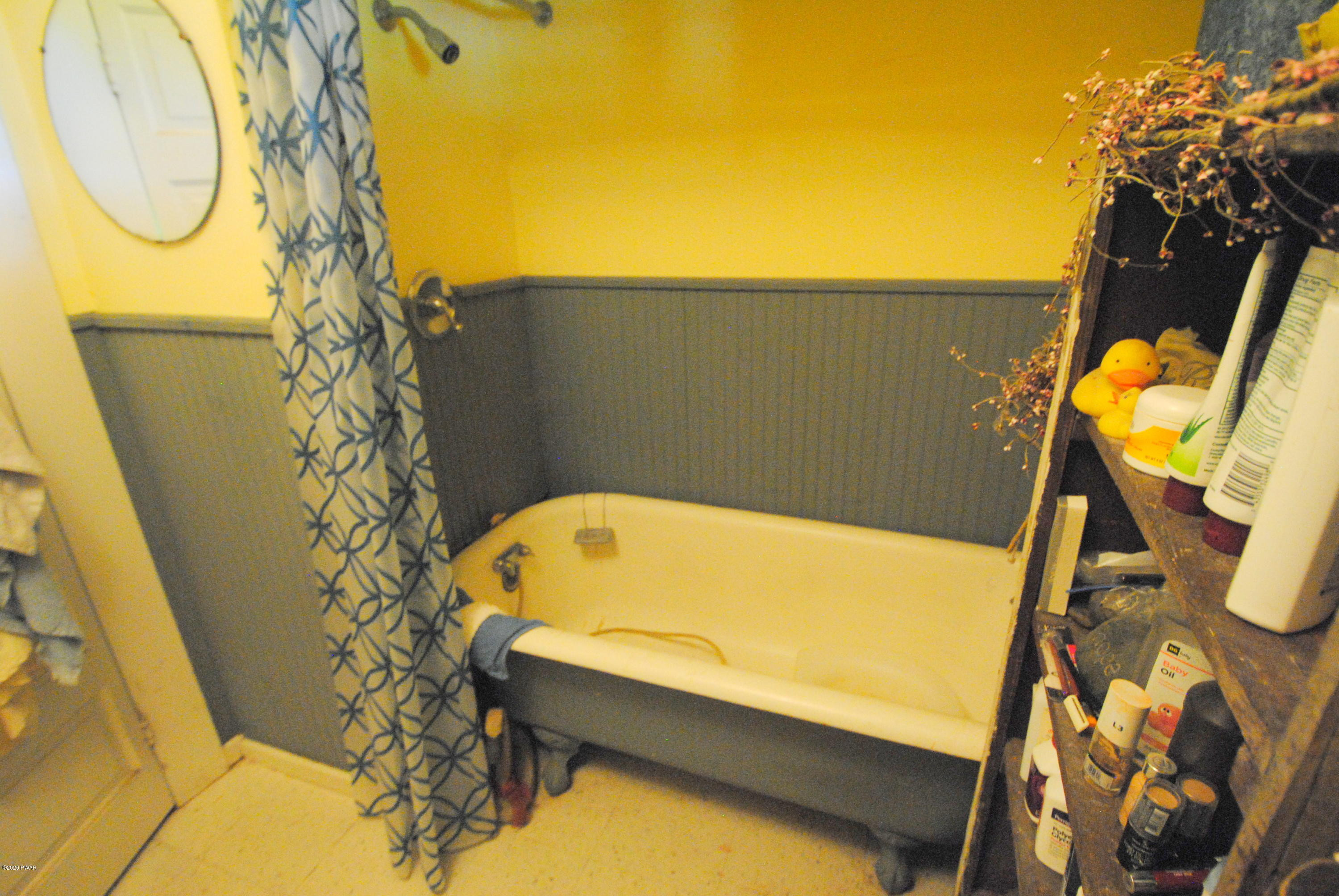 313 Old Racht Road Waymart, PA 18472 - Photo 34 of 39 a blue swimming pool with a yard