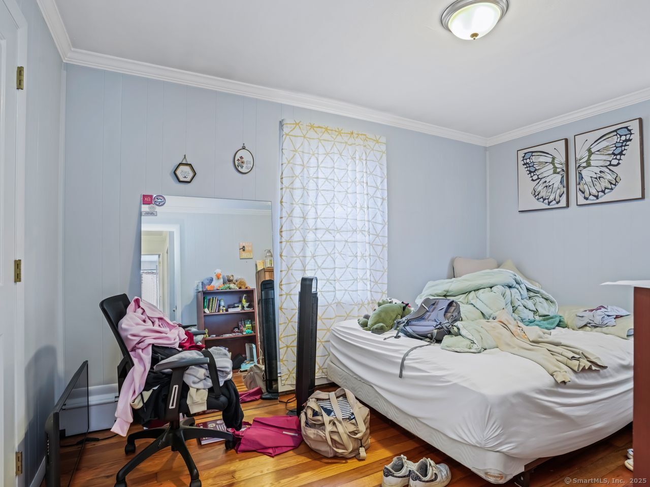 375 Ruth Street Bridgeport, CT 06606 - Photo 13 of 27 a bedroom with furniture and a window