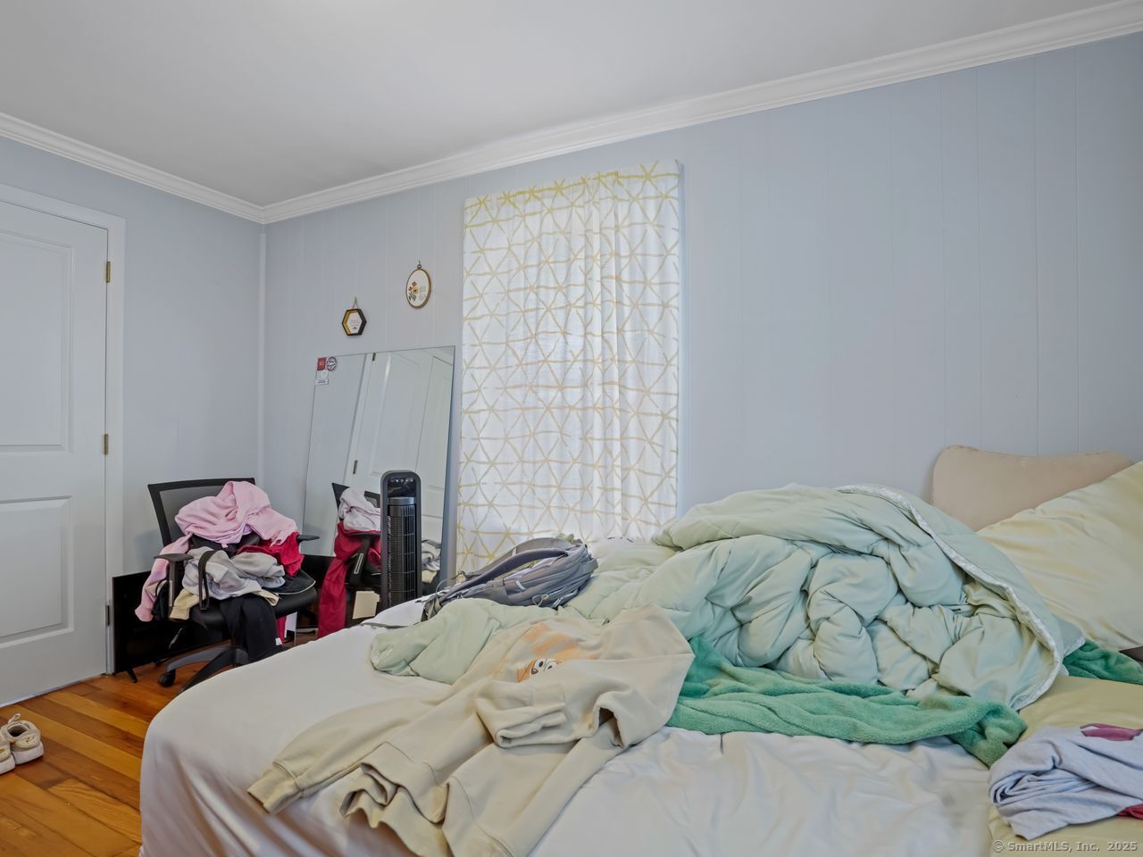 375 Ruth Street Bridgeport, CT 06606 - Photo 15 of 27 a bed room with two beds and a couch