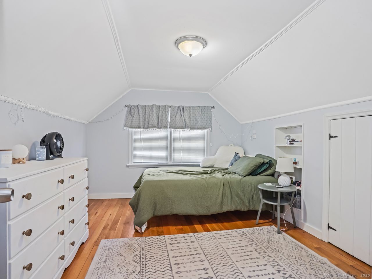375 Ruth Street Bridgeport, CT 06606 - Photo 16 of 27 a living room with a bed and a window