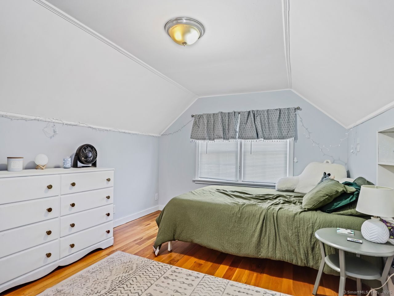 375 Ruth Street Bridgeport, CT 06606 - Photo 17 of 27 a bedroom with a bed and window