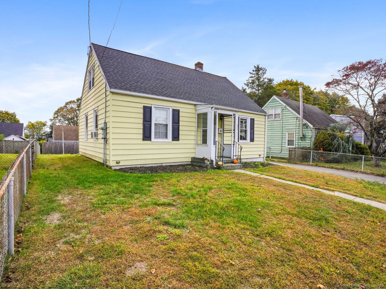 375 Ruth Street Bridgeport, CT 06606 - Photo 2 of 27 a view of a house with a backyard