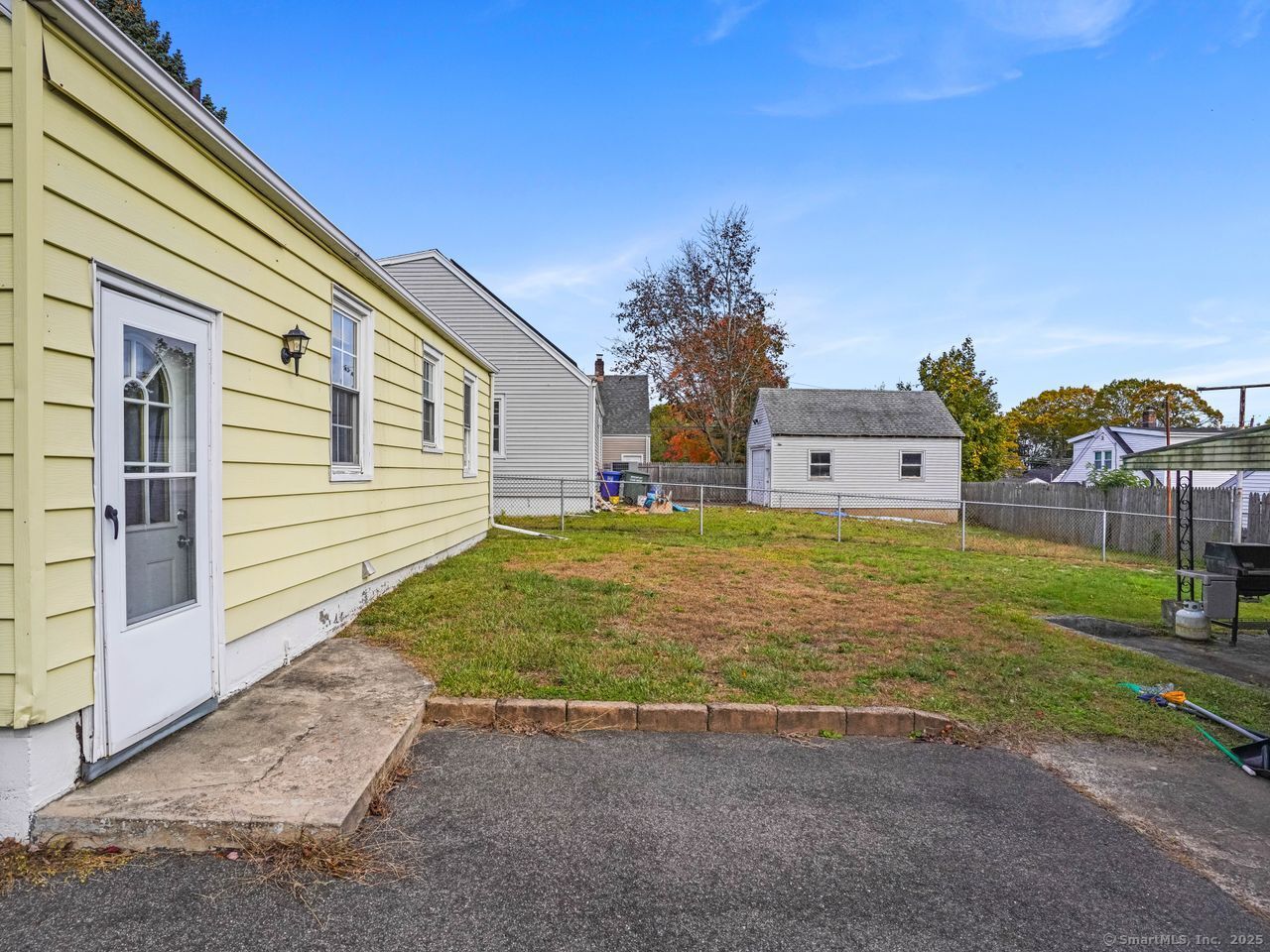 375 Ruth Street Bridgeport, CT 06606 - Photo 27 of 27 a view of a house with backyard and garden