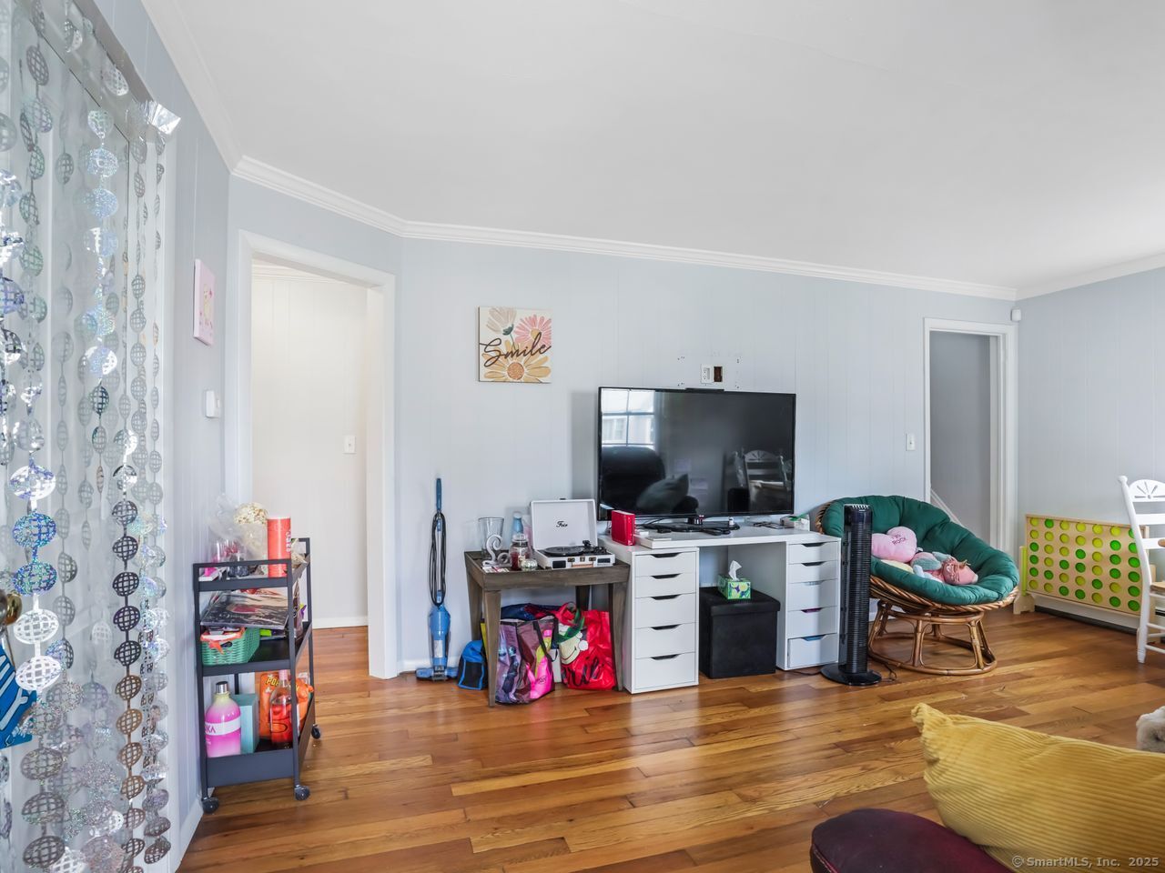 375 Ruth Street Bridgeport, CT 06606 - Photo 5 of 27 a view of a workspace with furniture and wooden floor