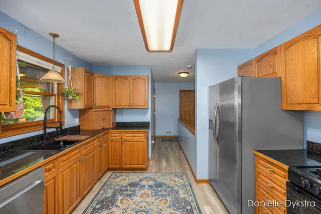 $450,000 | 10675 Mieras Drive Northeast, Sparta, MI 49345