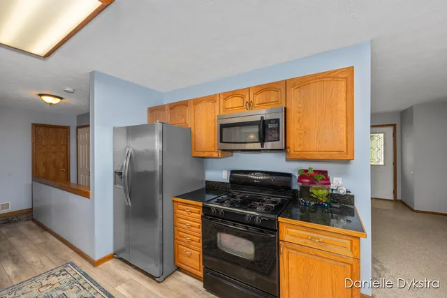 $450,000 | 10675 Mieras Drive Northeast, Sparta, MI 49345