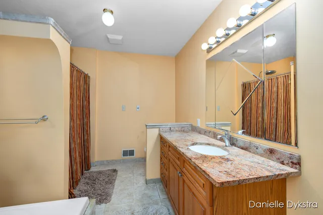 $450,000 | 10675 Mieras Drive Northeast, Sparta, MI 49345