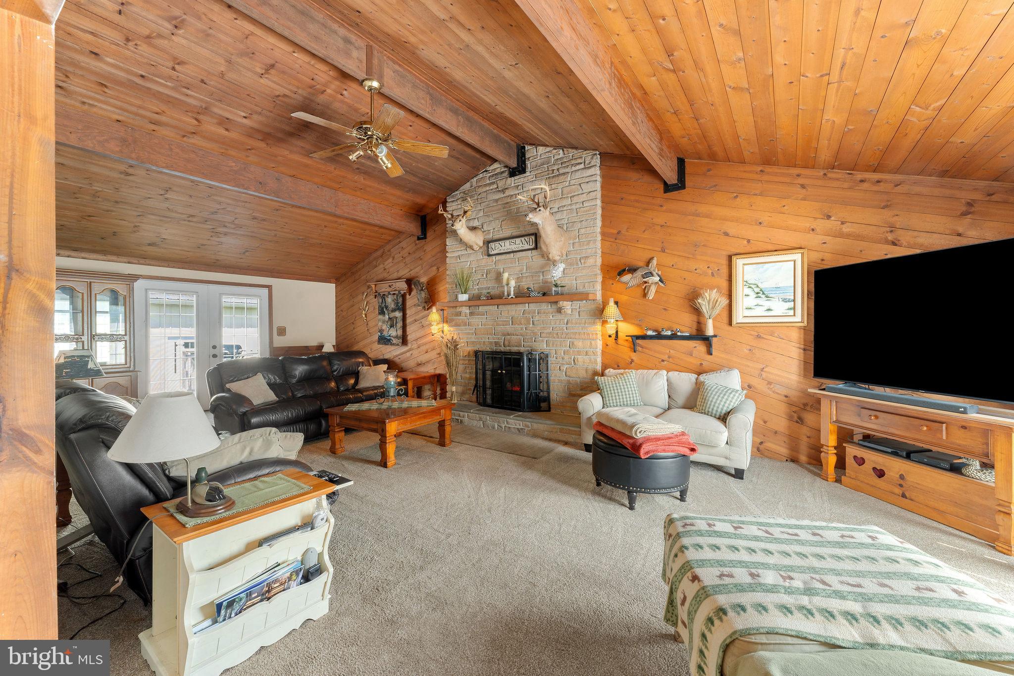 116 Kent Point Road Stevensville, MD 21666 - Photo 12 of 32 Oversized family room with vaulted ceilings