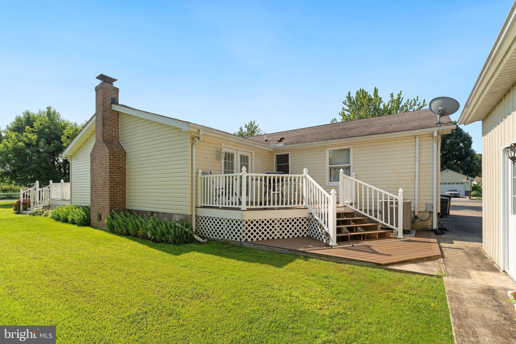 116 Kent Point Road Stevensville, MD 21666 - Photo 30 of 32 a view of a house with backyard and sitting area