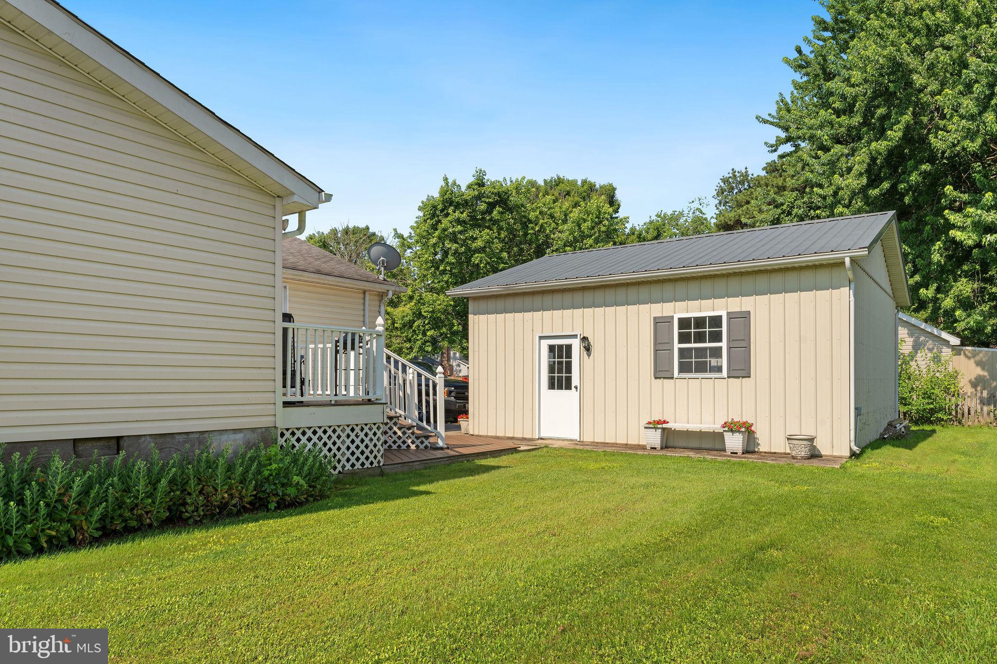 116 Kent Point Road Stevensville, MD 21666 - Photo 31 of 32 a view of a house with backyard and garden