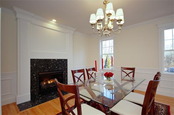 65 Munroe Road Lexington, MA 02421 - Photo 2 of 11 a dining room with furniture a chandelier and wooden floor