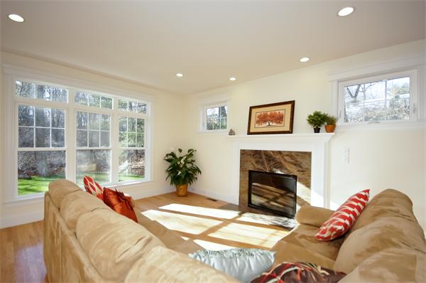 65 Munroe Road Lexington, MA 02421 - Photo 4 of 11 a living room with furniture and a fireplace