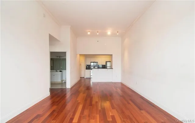 an empty room with a large window