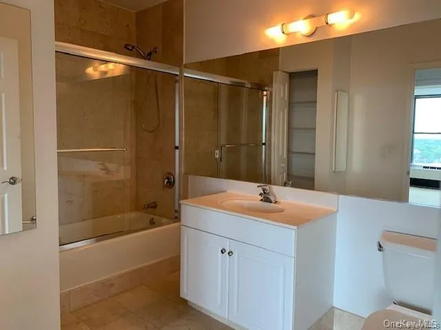 a kitchen with stainless steel appliances granite countertop a sink and a stove
