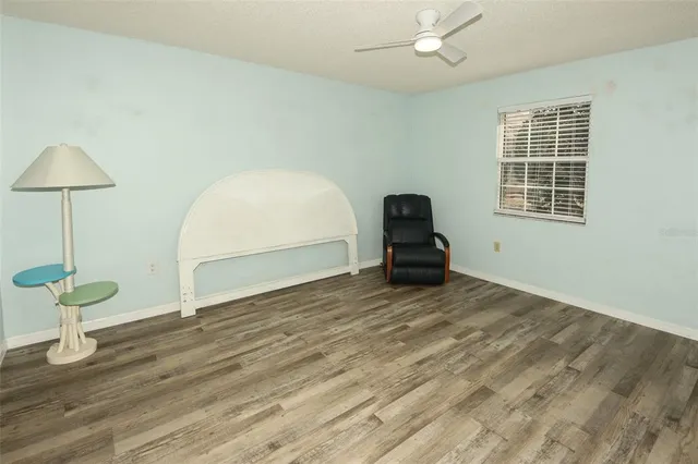 a bathroom with a toilet sink and shower