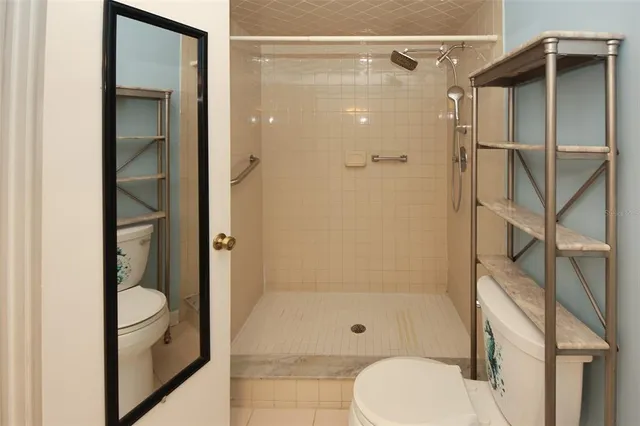 a view of a tree in front of a house