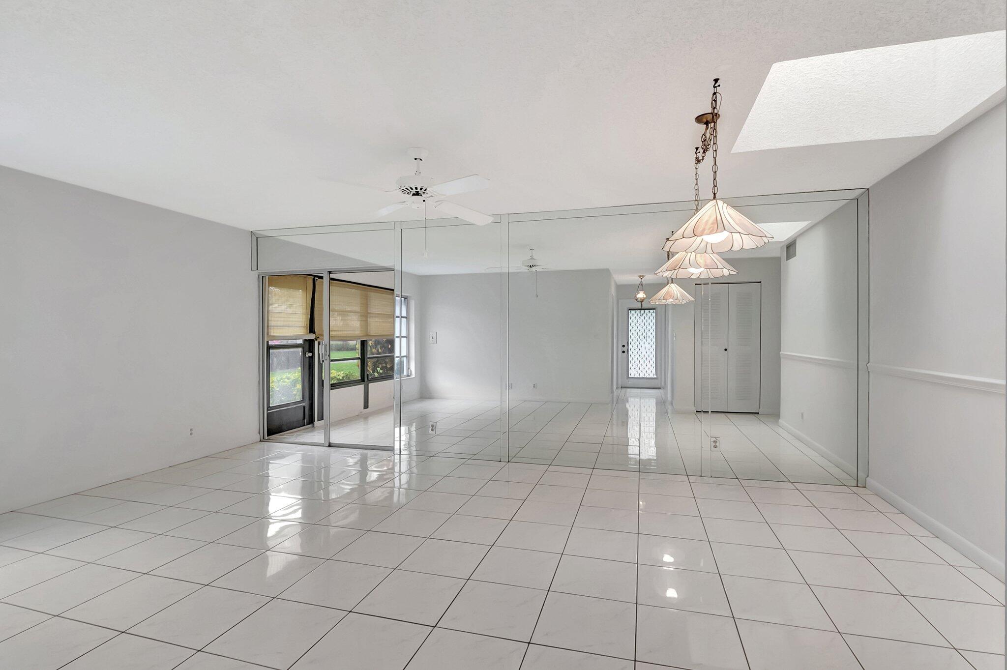 8772 Tyrone Terrace Boca Raton, FL 33496 - Photo 8 of 31 Dining/Living Room