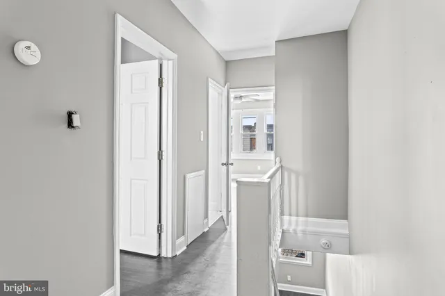 a view of a bathroom from the hallway