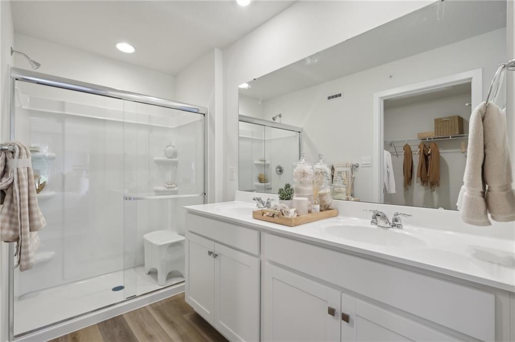 122 River Ridge Drive Coraopolis, PA 15108 - Photo 13 of 22 a bathroom with double sink shower and a mirror