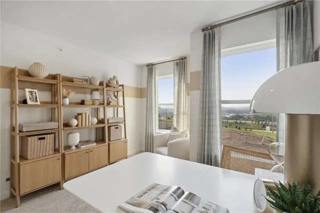 a kitchen with stainless steel appliances a refrigerator and a stove top oven
