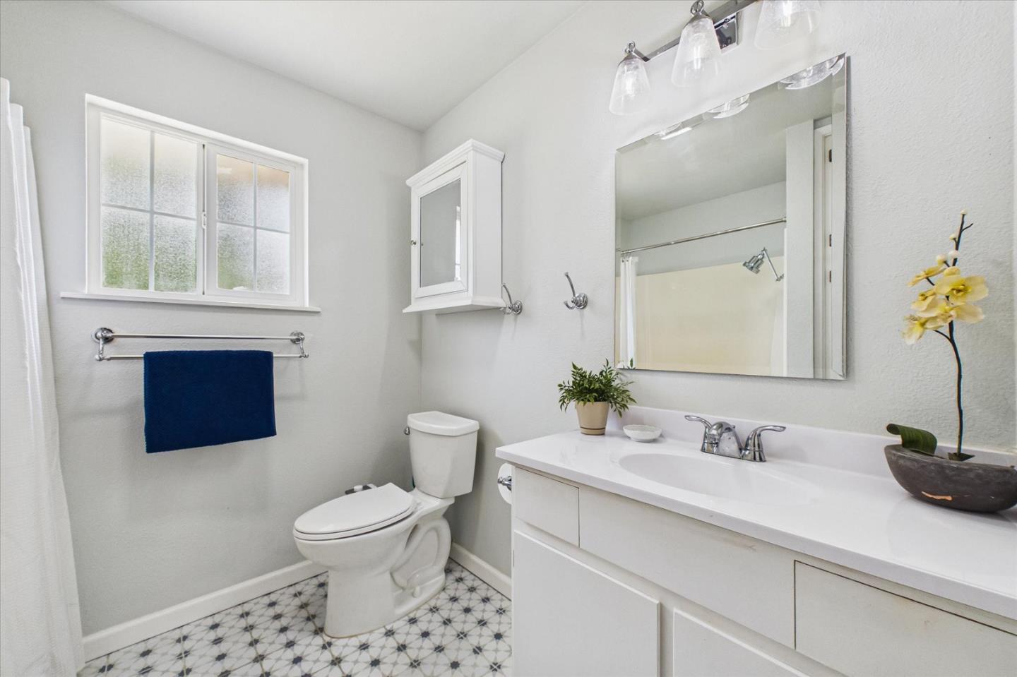 520 Redwood Road Whitethorn, CA 95589 - Photo 22 of 69 a bathroom with a sink a toilet and mirror