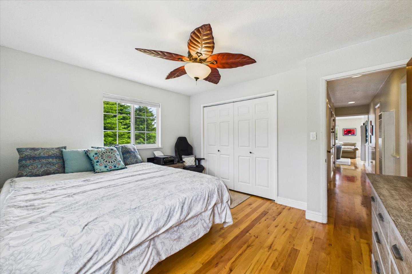 520 Redwood Road Whitethorn, CA 95589 - Photo 28 of 69 a bedroom with a bed and wooden floor