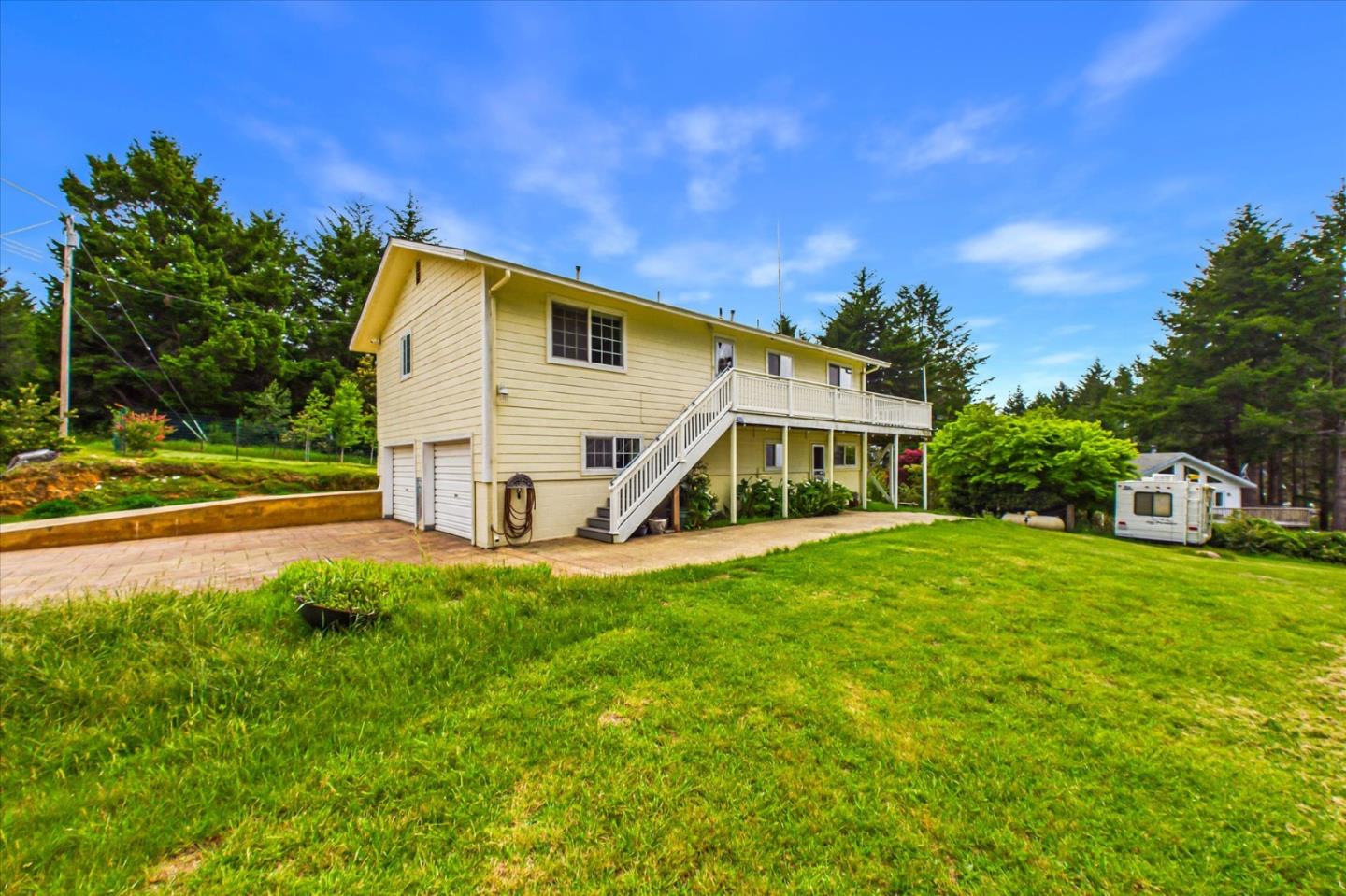 520 Redwood Road Whitethorn, CA 95589 - Photo 54 of 69 a view of a house with a yard