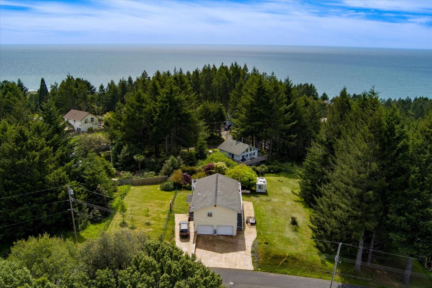 520 Redwood Road Whitethorn, CA 95589 - Photo 59 of 69 an aerial view of a house with a lake view