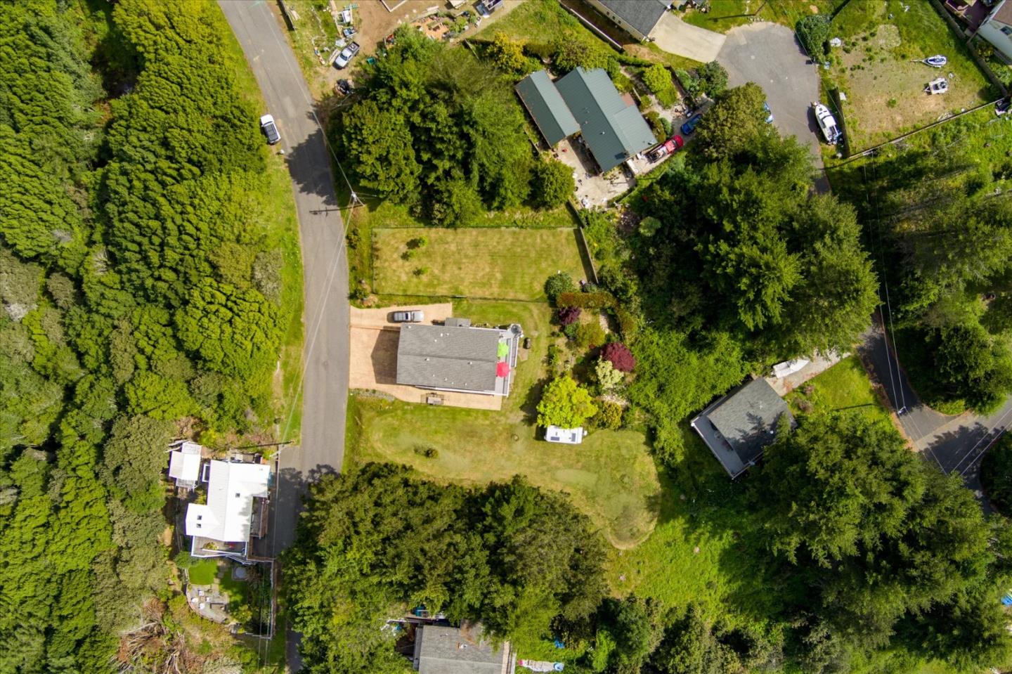 520 Redwood Road Whitethorn, CA 95589 - Photo 65 of 69 an aerial view of residential house with swimming pool