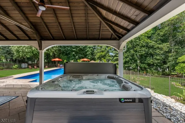 a view of a backyard with wooden floor